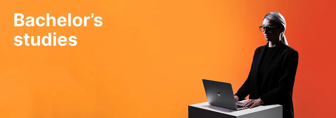 A KTU School of Economics and Business student working on a laptop against an orange decorative background. The faculty offers bachelor's studies. Choose KTU bachelor's studies.